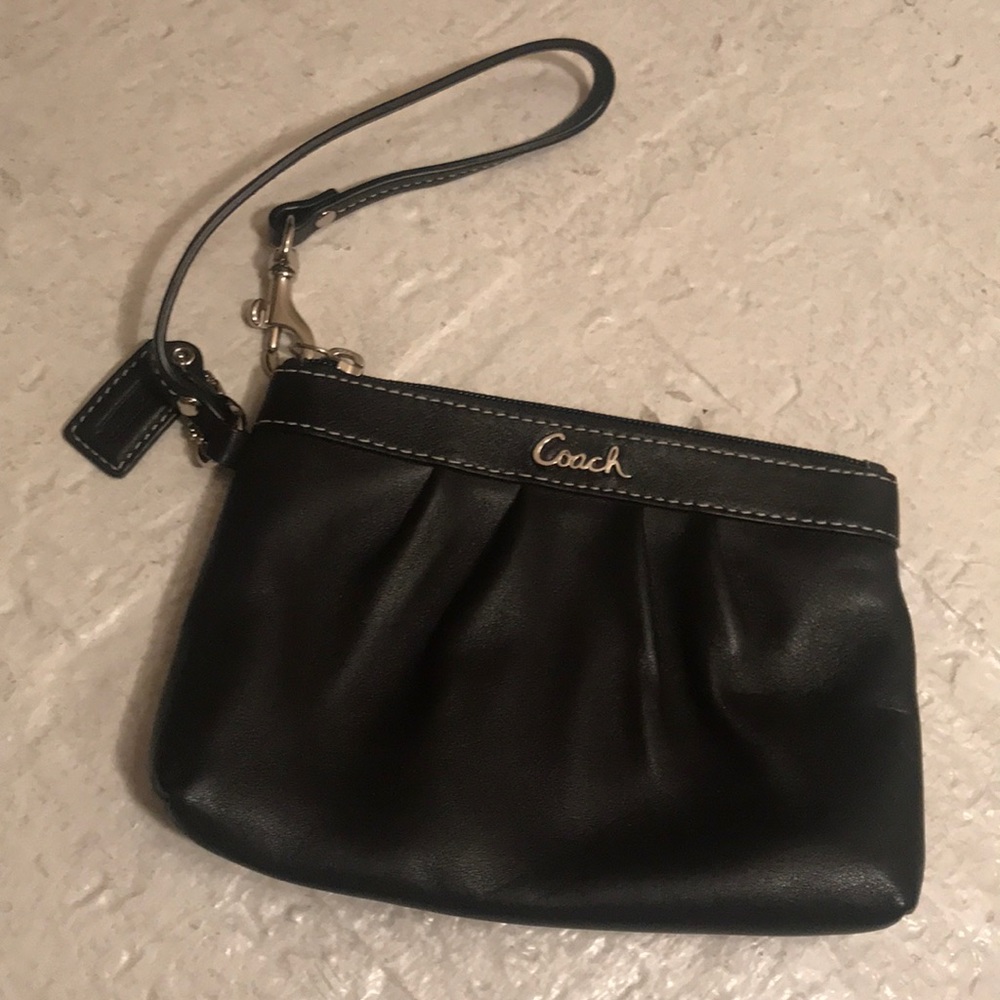 Like new condition! Small black coach wristlet!